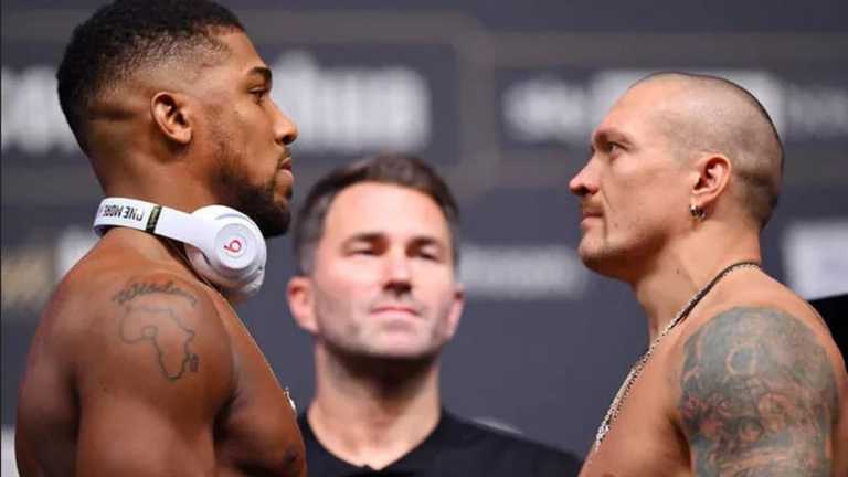 Джошуа та Усик / Getty Images Джошуа та Усик / Getty Images