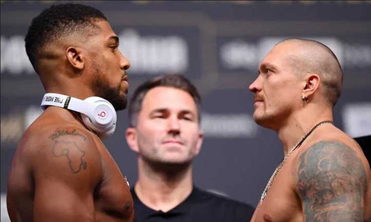 Джошуа и Усик / Getty Images Джошуа и Усик / Getty Images