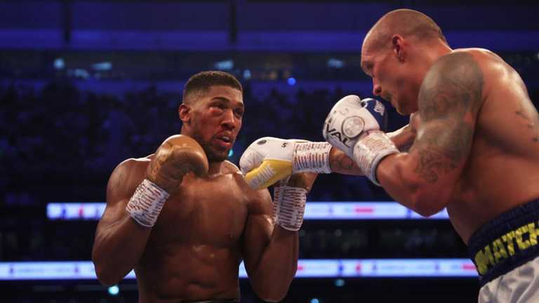 Джошуа та Усик / Getty Images Джошуа та Усик / Getty Images