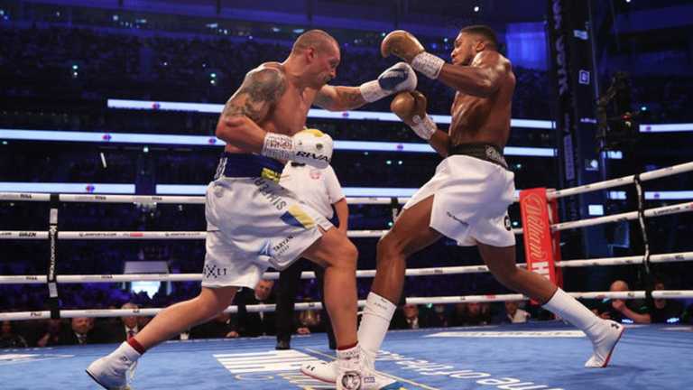 Усик та Джошуа / Getty Images Усик та Джошуа / Getty Images