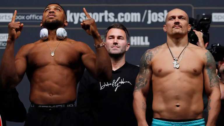 Джошуа и Усик / фото Reuters Джошуа и Усик / фото Reuters