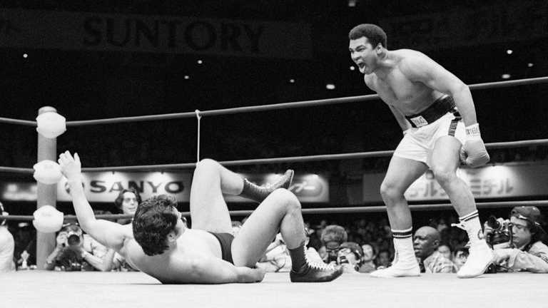 Али против Иноки / фото NYT Али против Иноки / фото NYT