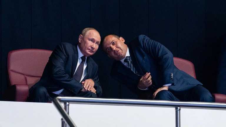 Умар Кремлев и Путин / Фото РБК
