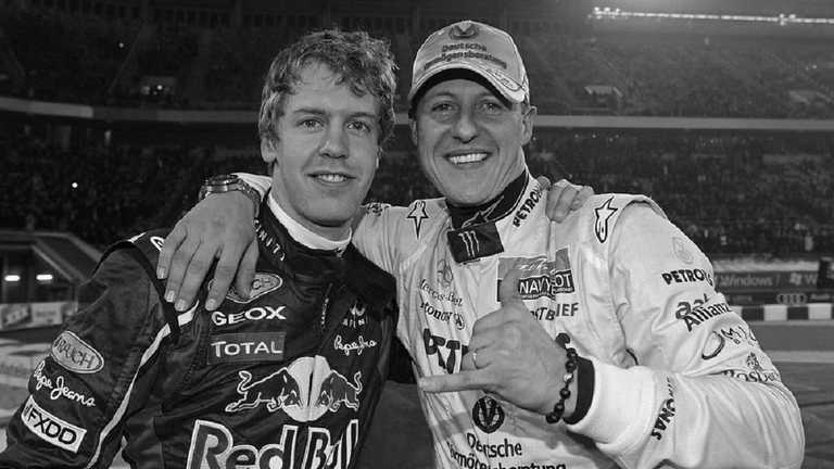 Михаэль Шумахер с Себастьяном Феттелем / Фото AFP Михаэль Шумахер с Себастьяном Феттелем / Фото AFP
