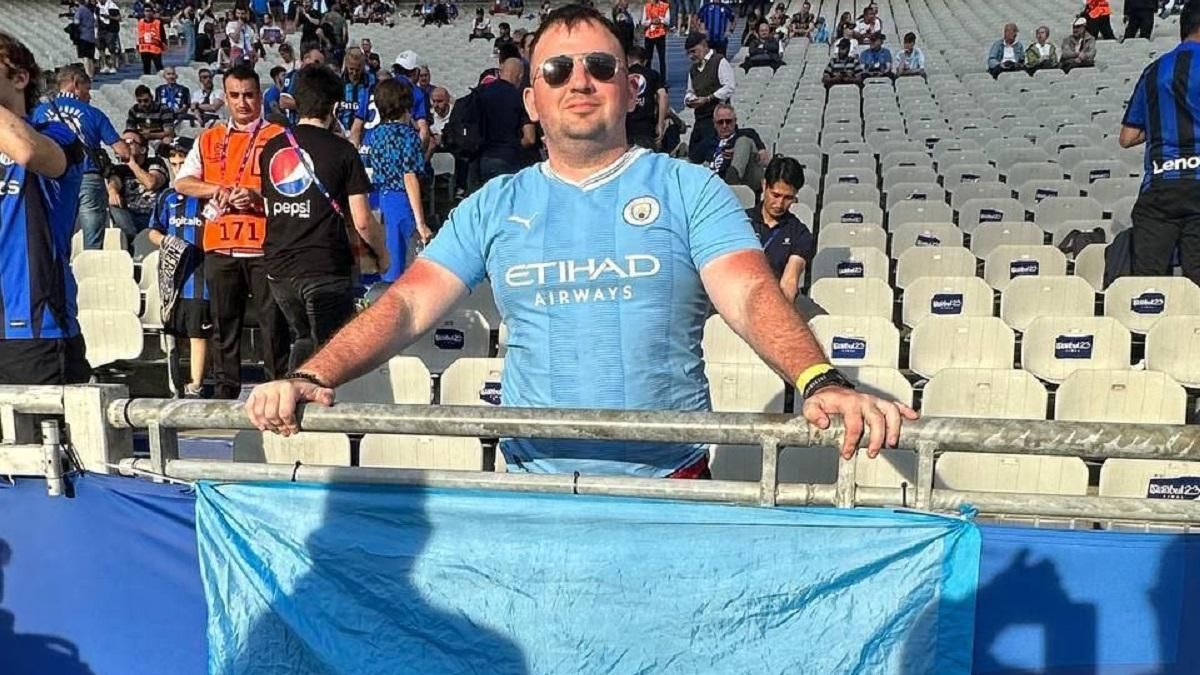 У вболівальника намагались відібрати український прапор під час фіналу ЛЧ / Фото Telegram-канал Бомбардир