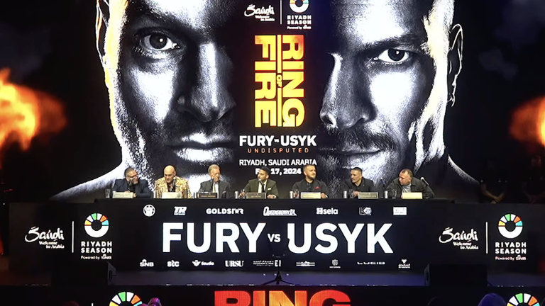 Усик и Фьюри провели первую дуэль взглядов/скриншот по трансляции Усик и Фьюри провели первую дуэль взглядов/скриншот по трансляции