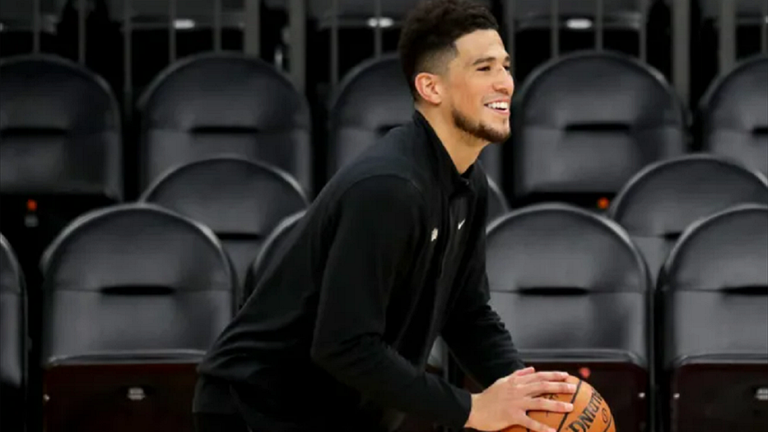 Девін Букер / Фото Фото Mike De Sisty / Milwaukee Journal Sentinel Девін Букер / Фото Фото Mike De Sisty / Milwaukee Journal Sentinel