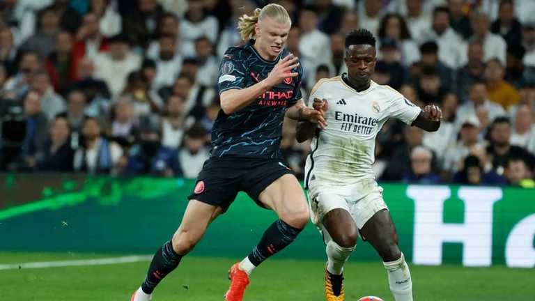 Холанд против Винисиуса / Фото EFE Холанд против Винисиуса / Фото EFE