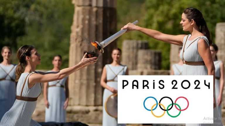 Олімпійський вогонь / Фото EFE Олімпійський вогонь / Фото EFE