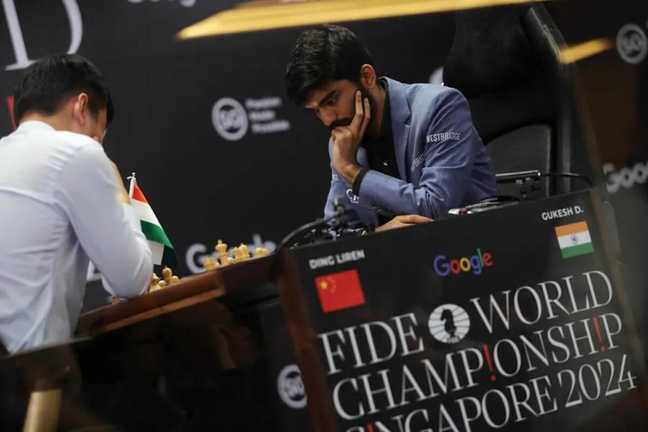 Дін Ліжень – Гукеш Доммараджу / фото EFE Дін Ліжень – Гукеш Доммараджу / фото EFE