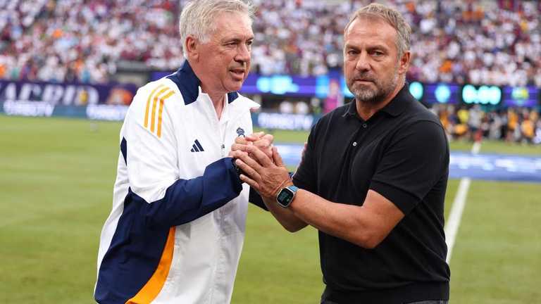 Карло Анчелотті та Ганс-Дітер Флік / Фото Getty Images Карло Анчелотті та Ганс-Дітер Флік / Фото Getty Images