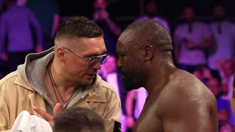 Олександр Усик та Дерек Чісора / Getty Images