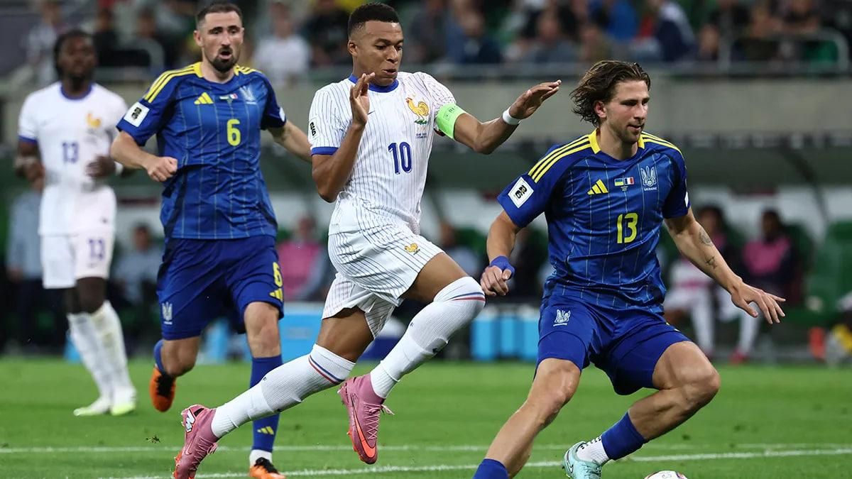 Калюжный, Мбаппе и Забарный / Фото Getty Images