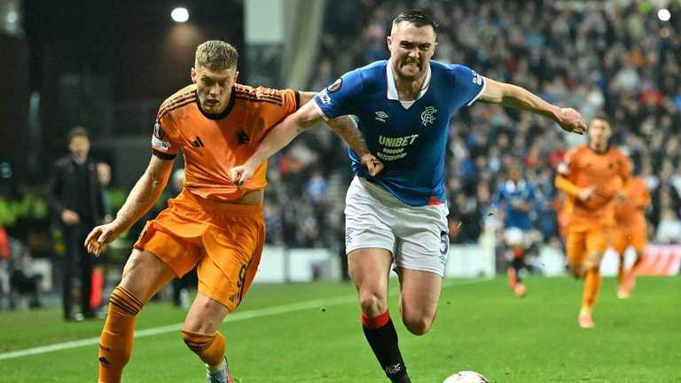 Артем Довбик та Джон Суттер / Фото by ANDY BUCHANAN/AFP via Getty Images Артем Довбик та Джон Суттер / Фото by ANDY BUCHANAN/AFP via Getty Images