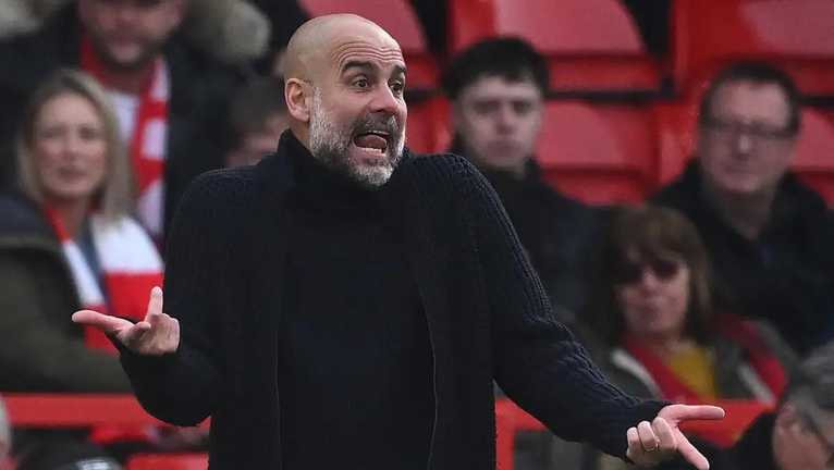 Хосеп Гвардиола / Photo by JUSTIN TALLIS/AFP via Getty Images